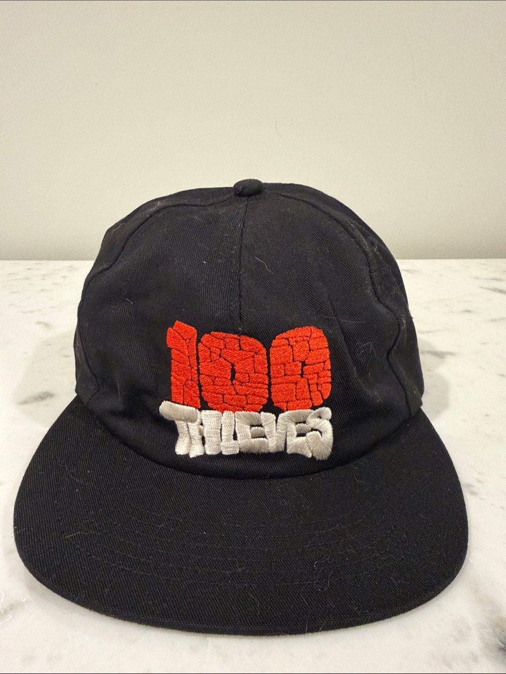 NWT Black Cap with Red and White '100 Thieves' Embroidered Logo